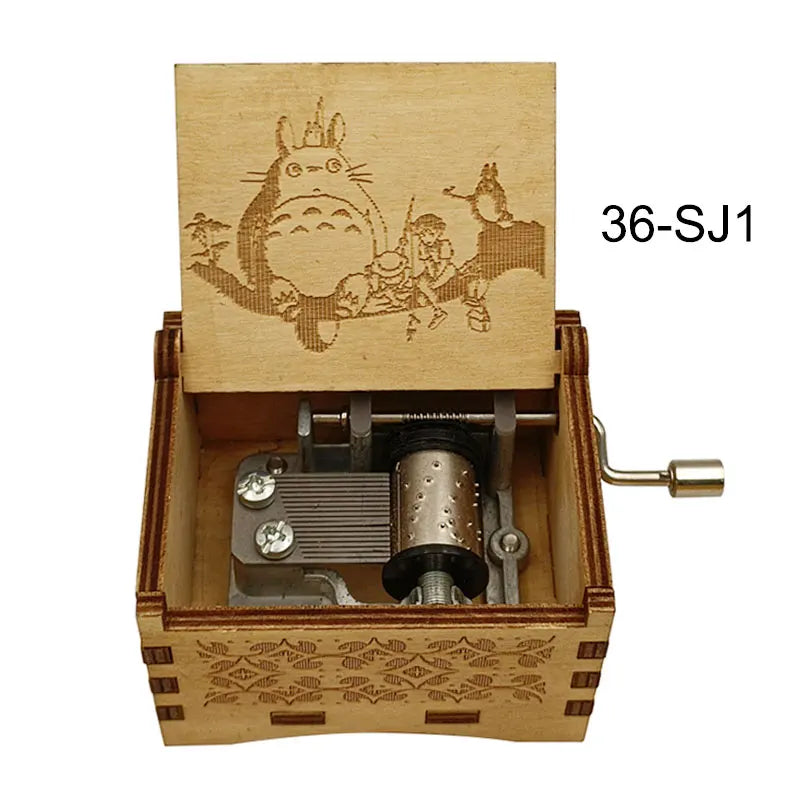 A wooden music box featuring an engraved anime character design and a mechanical mechanism.