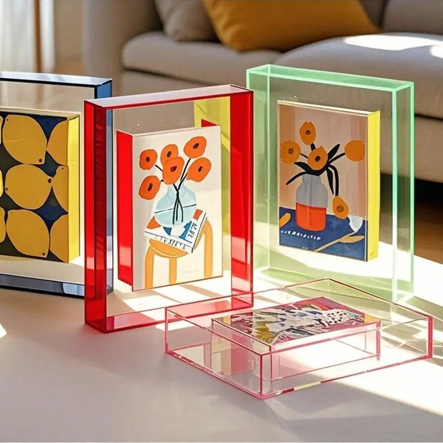 Three vibrant acrylic photo frames in red, green, and yellow display DIY message boards on a white table.