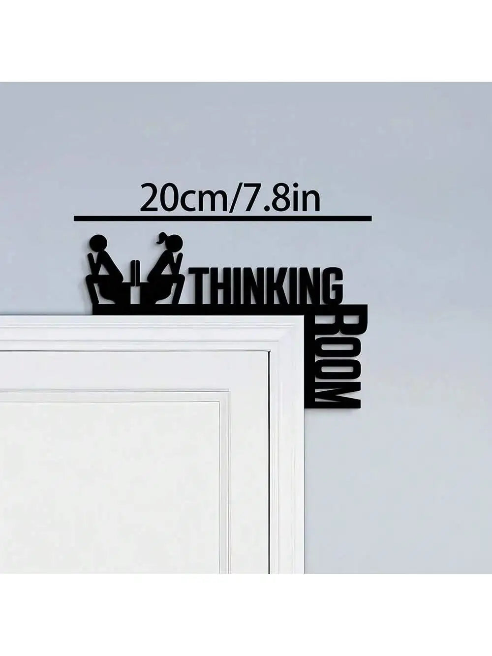 Black metal wall art featuring silhouettes of two praying figures and the word THINKING BOOM