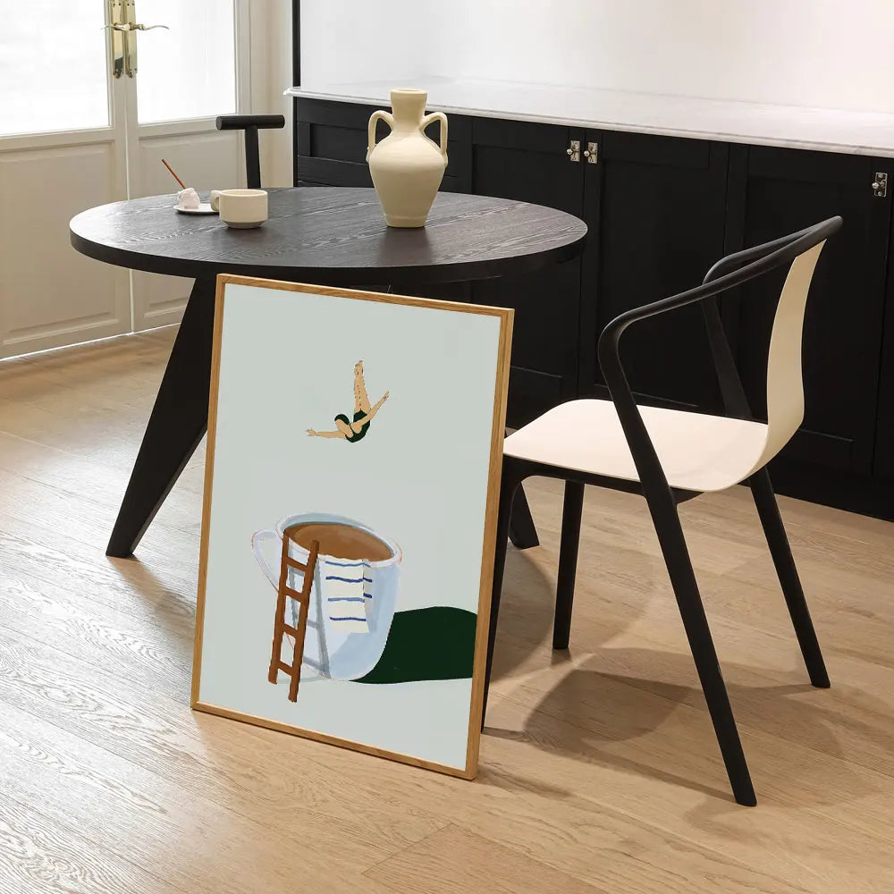 A canvas print featuring an abstract depiction of a coffee cup and a small bird on a light background.