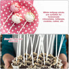 Pink plate with white lollipop sticks and white lollipops for homemade chocolates and candies