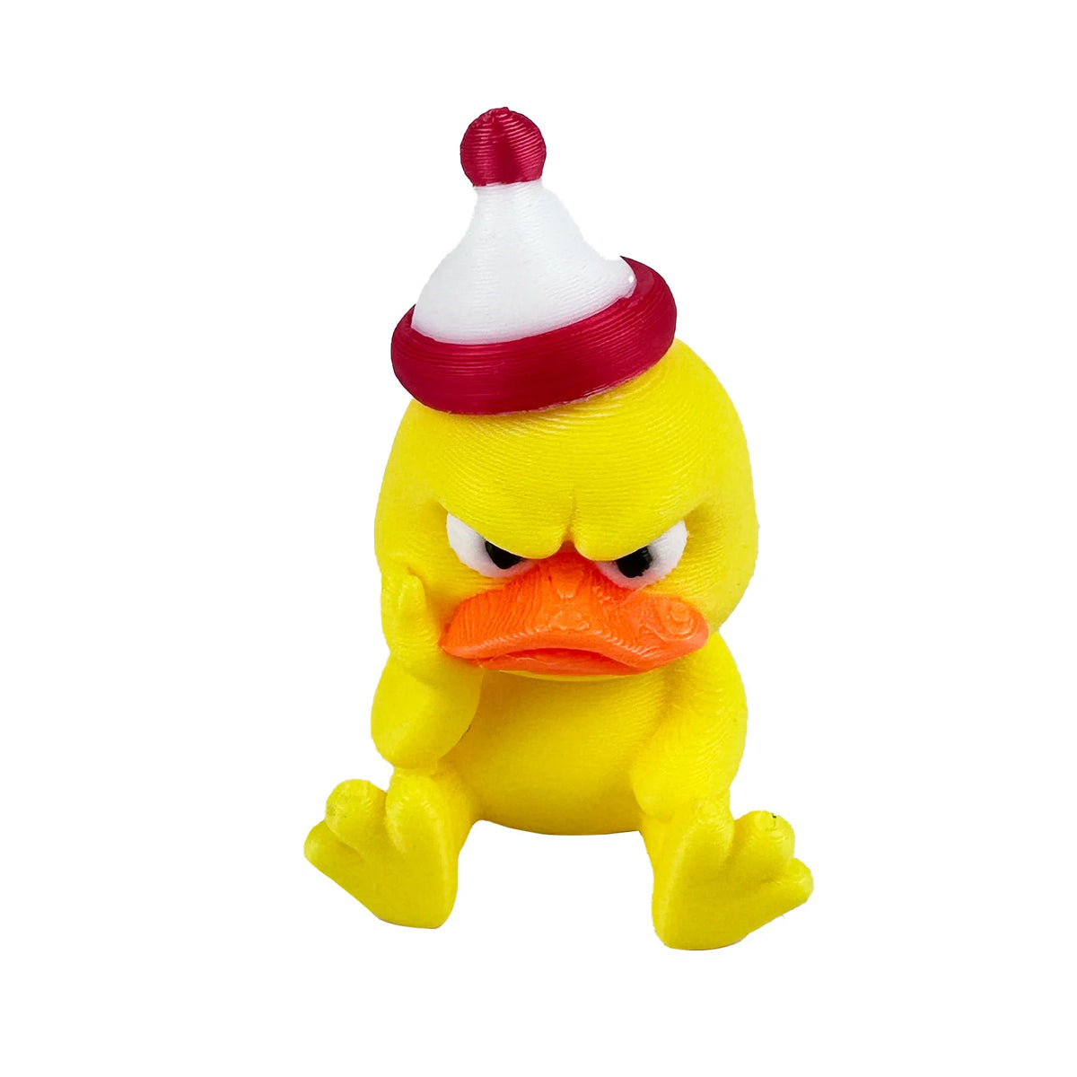 A yellow duck figurine with a red hat and an angry expression.
