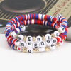 Beaded stretch bracelets featuring the words Freedom and America in red, white, and blue colors.