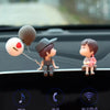 A set of cute couple balloon car ornaments featuring two figures and a pink animal on a black background.