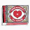 A black and red graphic design featuring a heart and text that reads Love Actually is all around