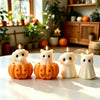 A set of silicone candle molds featuring cute ghost, cat, dog, and pumpkin designs for crafts.