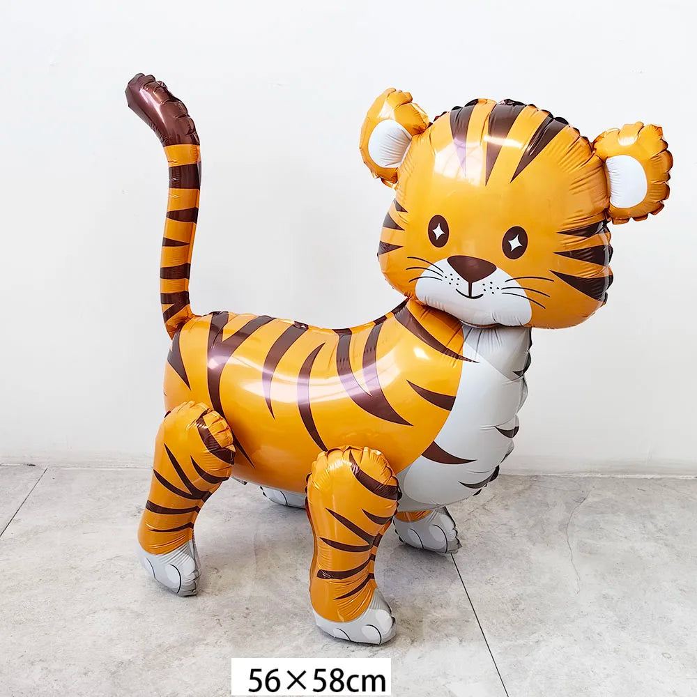 A large foil balloon shaped like a tiger, featuring orange and black stripes, standing on a light gray floor.