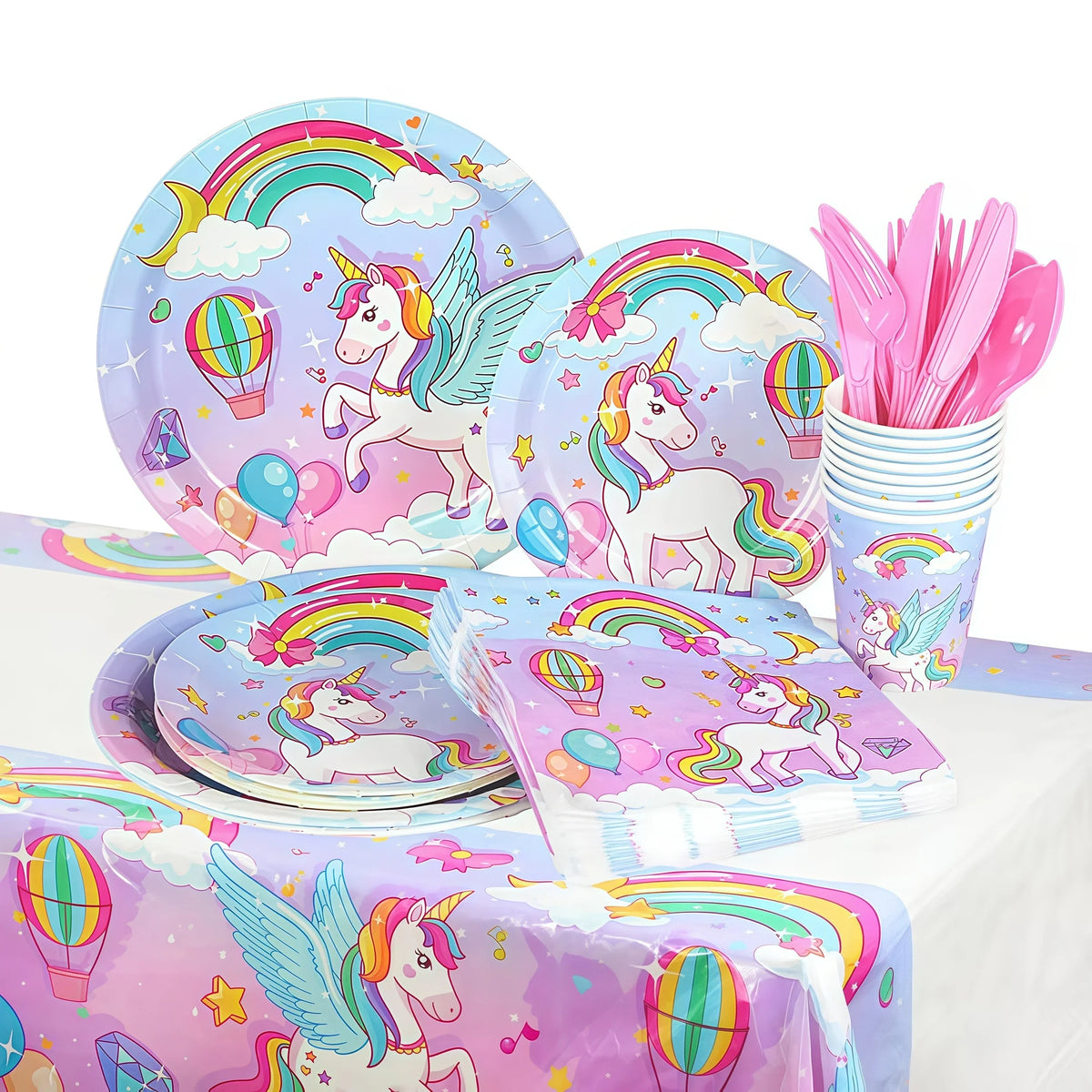 A set of unicorn themed birthday party supplies including plates, napkins, and pink feathers.