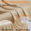 A close-up of silky beige polyester fabric draped beautifully, showing a wrinkle-free curtain for events.