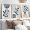 A set of three abstract geometric wall art prints featuring blue and beige tones with line drawings.