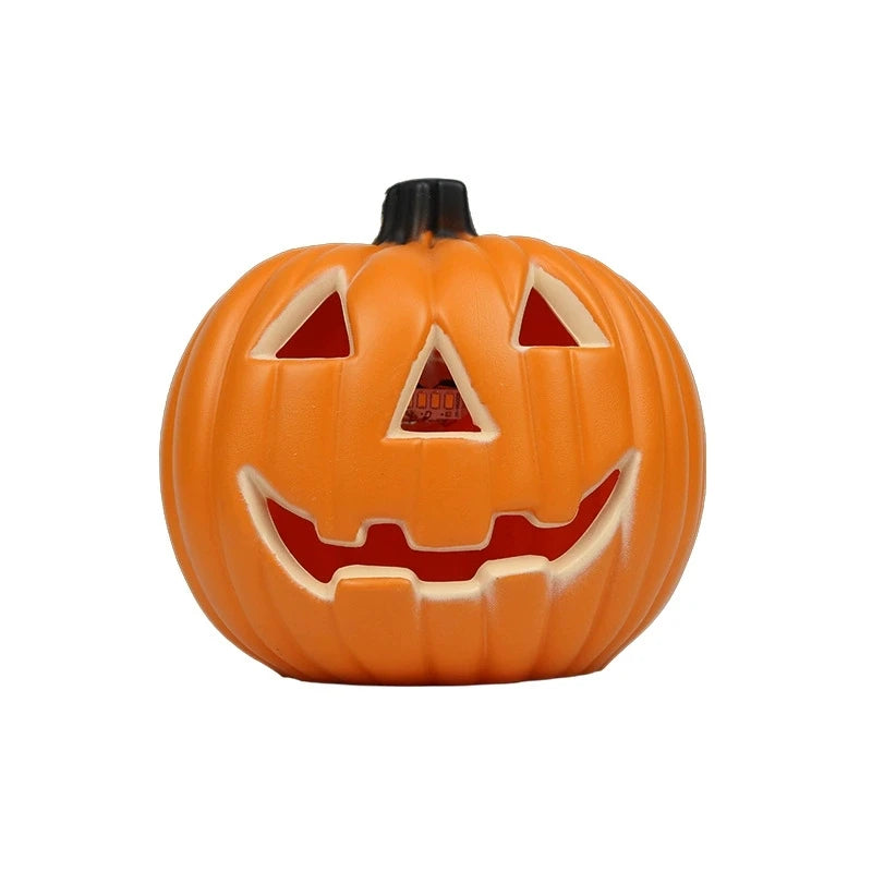 An orange carved pumpkin decoration with a smiling face and a black stem.