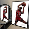 A painting of a basketball player dunking, rendered in red and black tones on canvas wall art.