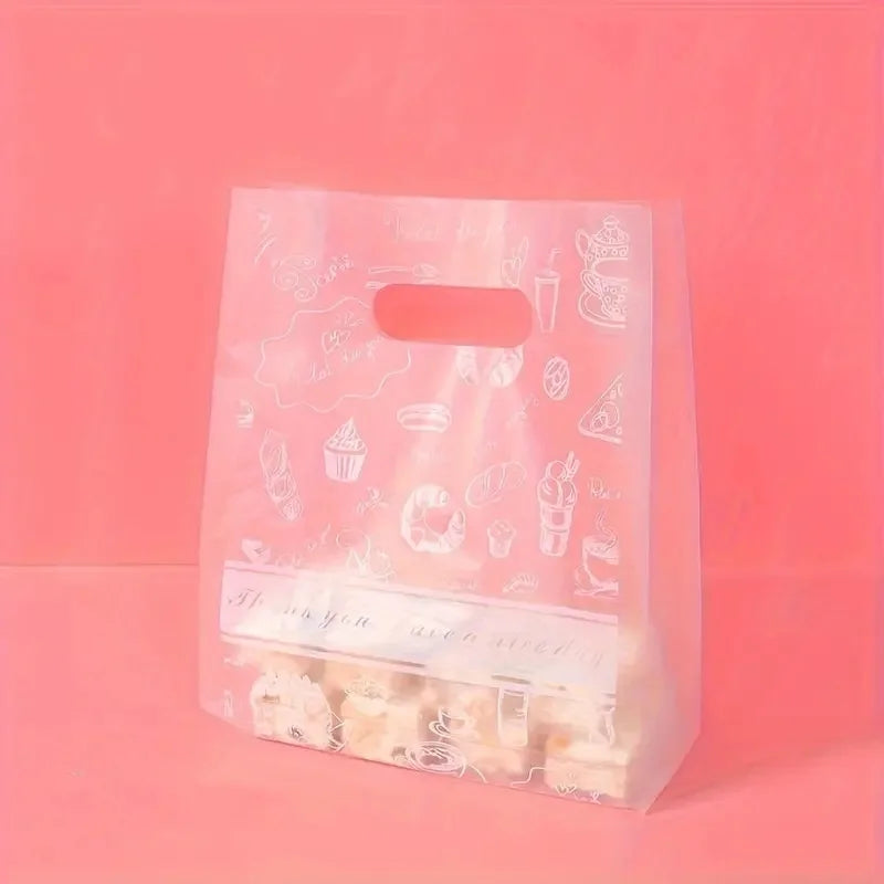 A clear plastic gift bag with a white daisy print design filled with small white treats on a pink background.
