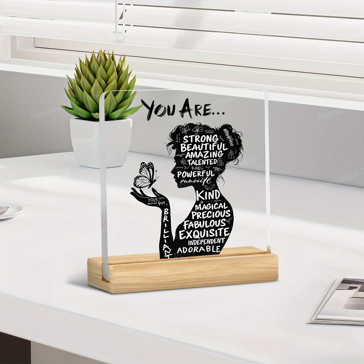 Acrylic positive affirmation desk decor featuring a silhouette of a woman with text like strong beautiful amazing talented an