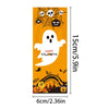 A vertical label with a spooky spiderweb design and the text HAPPY HALLOWEEN on an orange background.