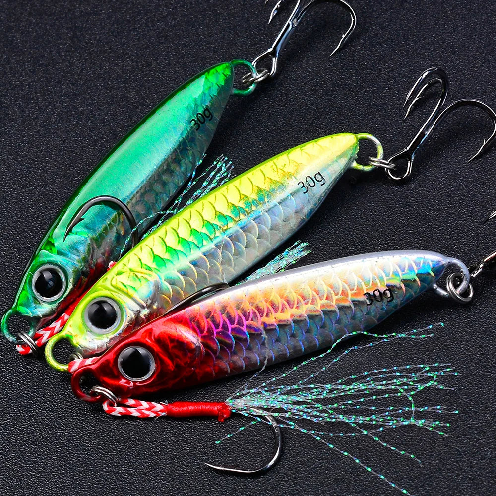 A set of three metal jig fishing lures with hooks and feather blades displayed against a black background.