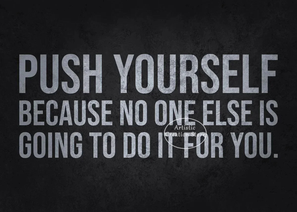 A motivational quote print on a dark background that reads Push Yourself because no one else is going to do it for you.
