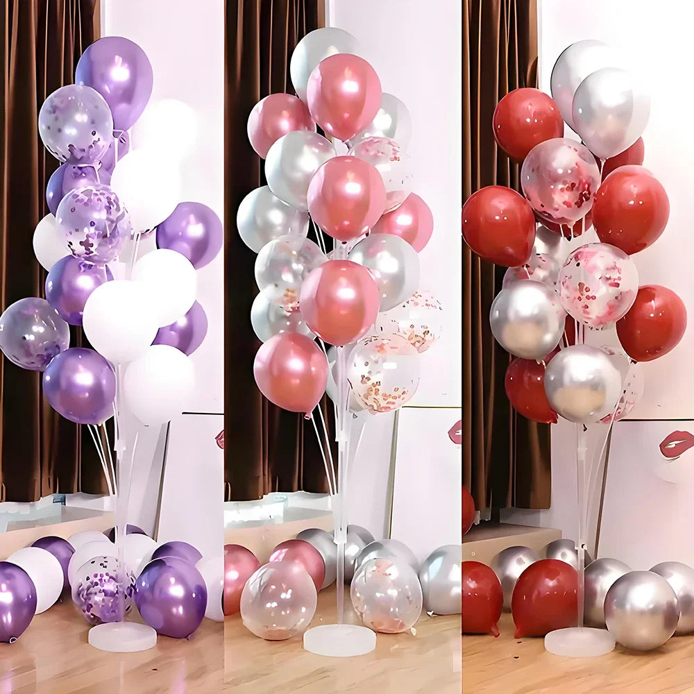 Elegant balloon column stand displaying various shades of pink, purple, and silver balloons.
