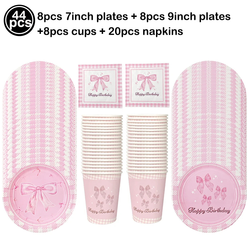 Pink bow disposable party tableware set including 8 pieces of 7 inch and 9 inch plates, cups, and napkins.
