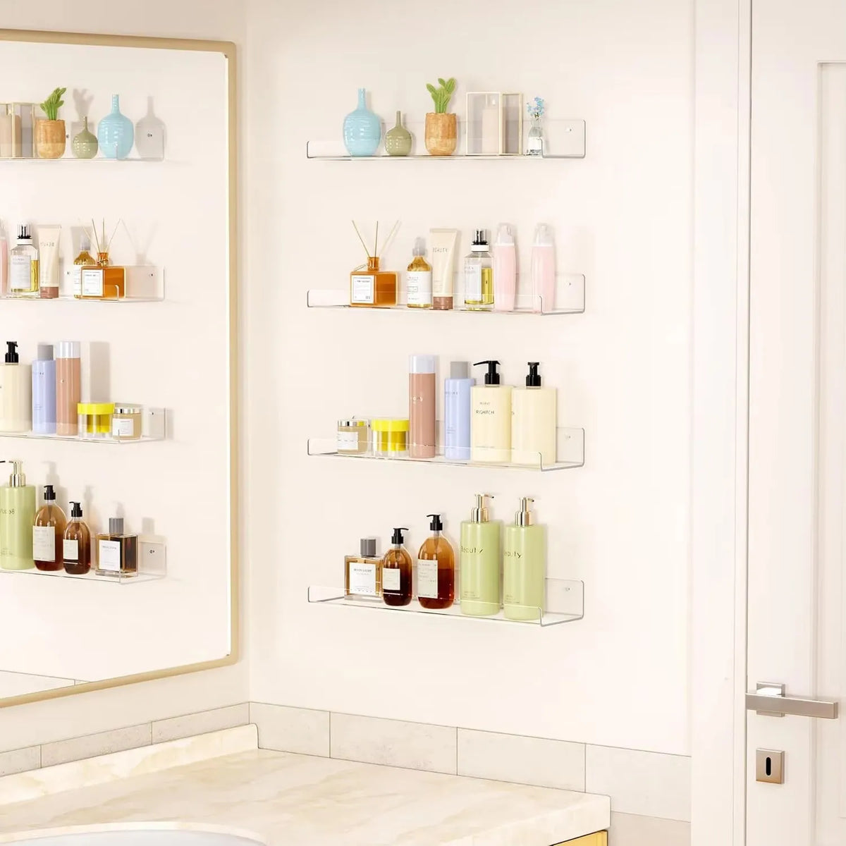 A display of various skincare and beauty products stored in clear acrylic floating racks on a white wall.