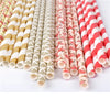A collection of colorful striped and polka dot paper drinking straws in various patterns.