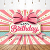 A pink bow tie birthday party backdrop banner featuring vertical stripes and gold accents.