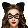 A woman wearing a black cat ear headband and eye mask set for a costume party