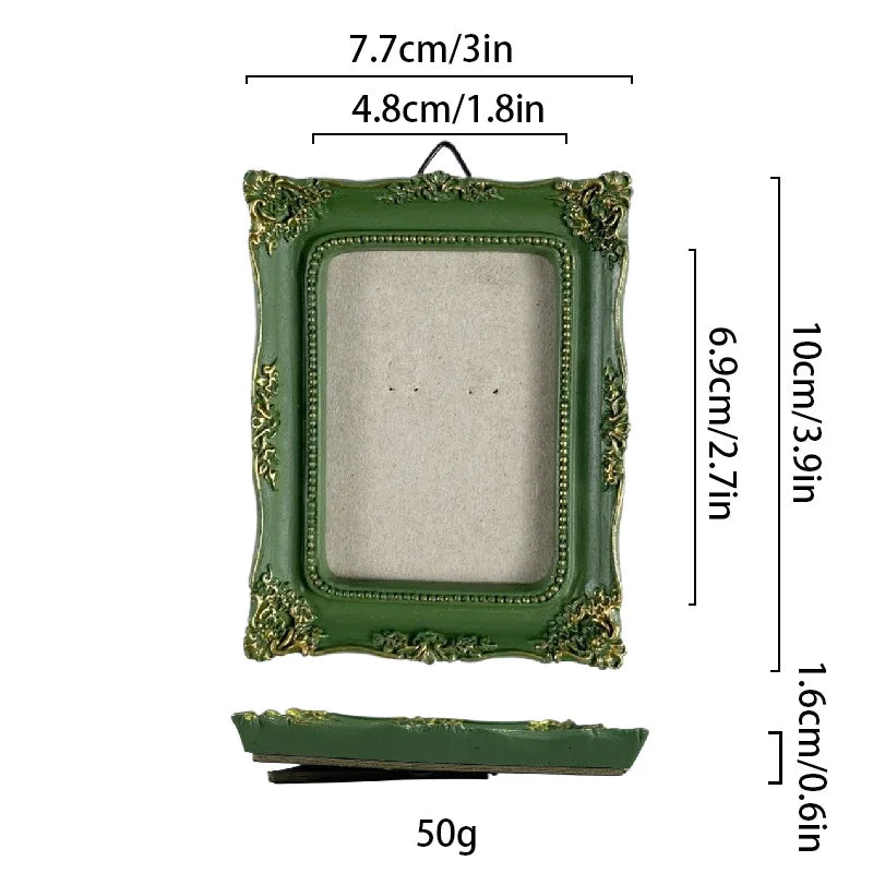 A vintage baroque resin picture frame in olive green with gold accents, shown with dimensions and weight.
