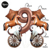 A set of foil balloons shaped like a number 9 and two horses with decorative wheels.