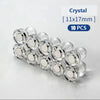 A pack of 10 clear crystal pin magnets with plastic shells, measuring 11x17mm.