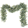 Green eucalyptus leaf garland with small white accents used for home decor