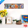 Vintage aluminum metal wall art sign with the text PAPA'S GARAGE on a white background