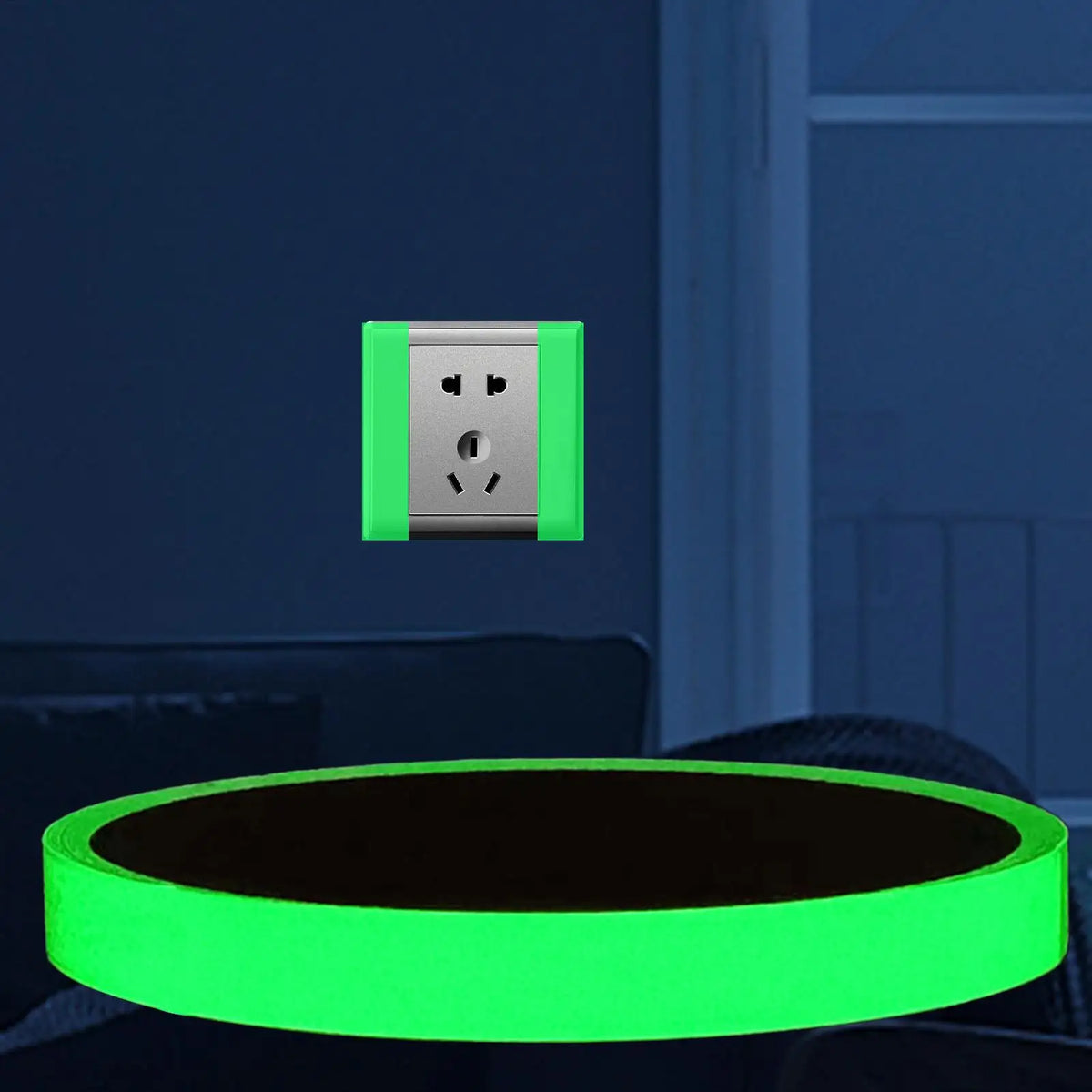 A glowing neon green safety warning tape is placed on a dark surface next to a silver electrical outlet.