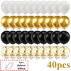 Ein Set von 40 Latexballons in Weiß, Gold und Schwarz matt mit Schleife.