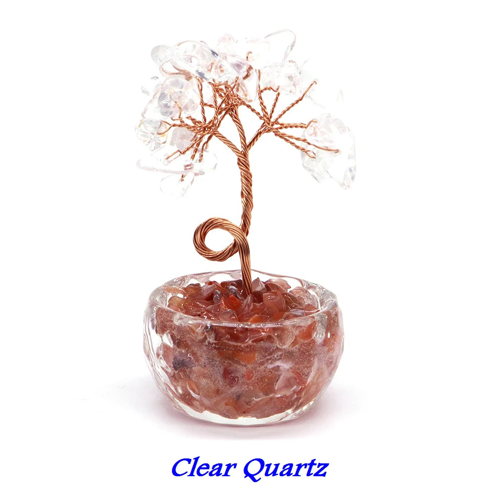 Clear quartz crystal tree bonsai with branches made of clear quartz growing from a reddish-brown stone base