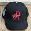 Black baseball cap embroidered with a red star logo