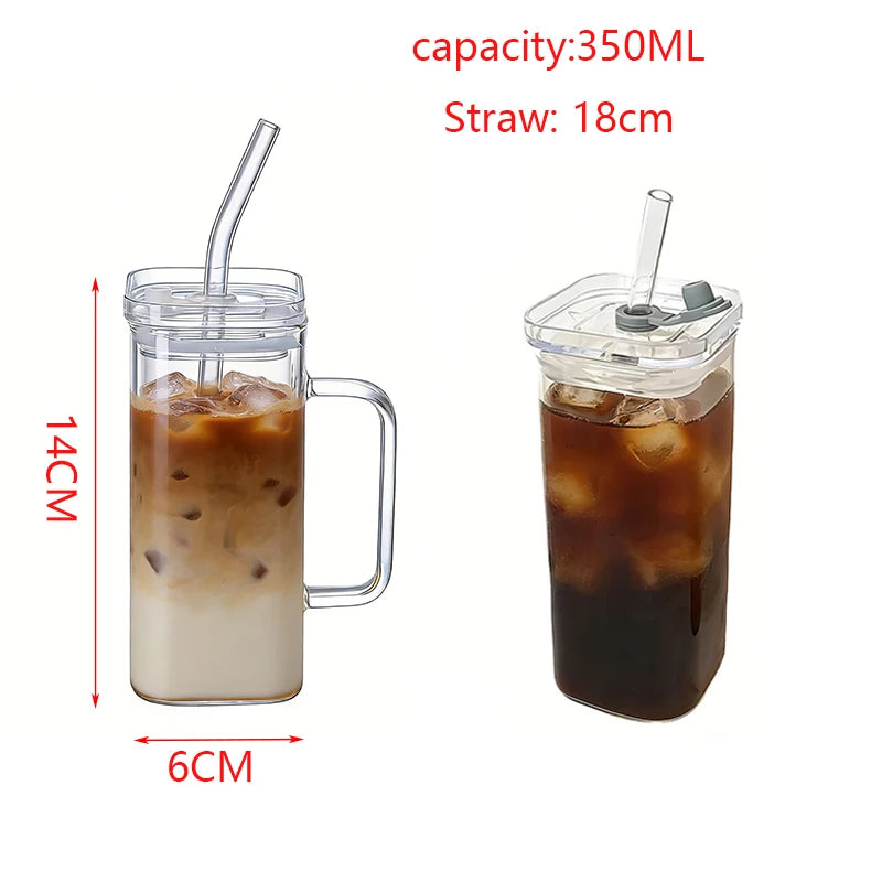 Insulated glass coffee mug with lid and straw containing iced coffee
