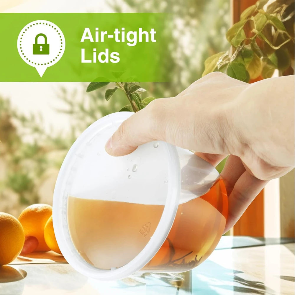 A hand is holding a clear deli-style meal prep container with an airtight lid, showing the product.