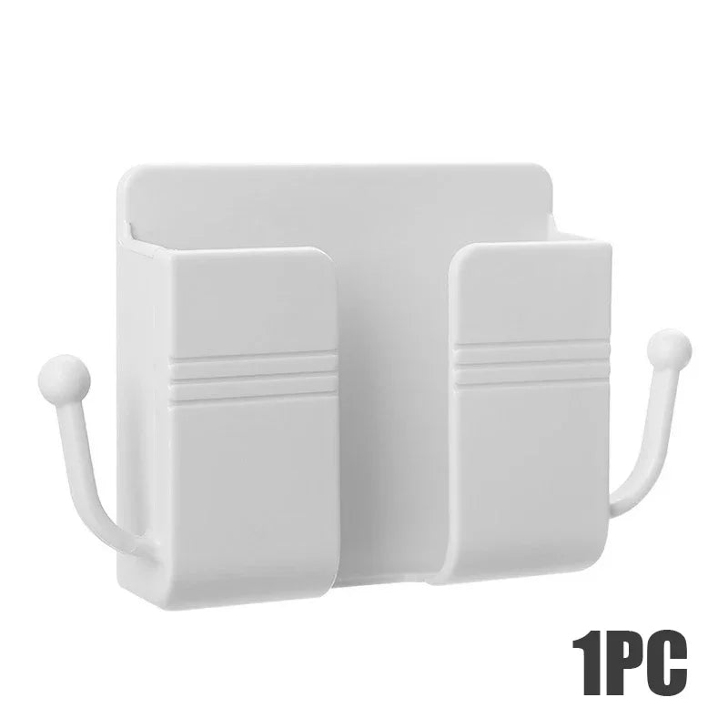 A white wall-mounted multifunctional organizer with a phone holder and charging dock.
