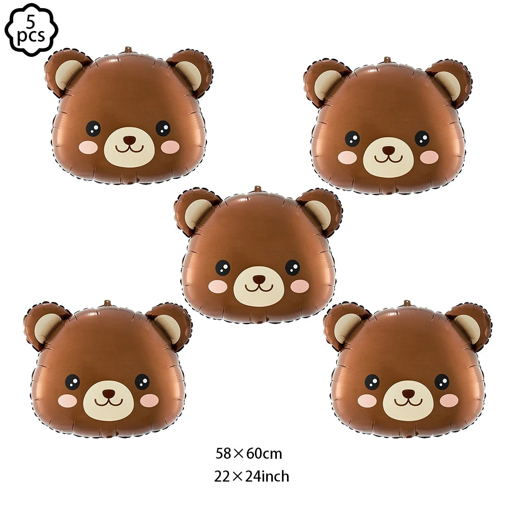 Five brown inflatable teddy bears used for a birthday party banner