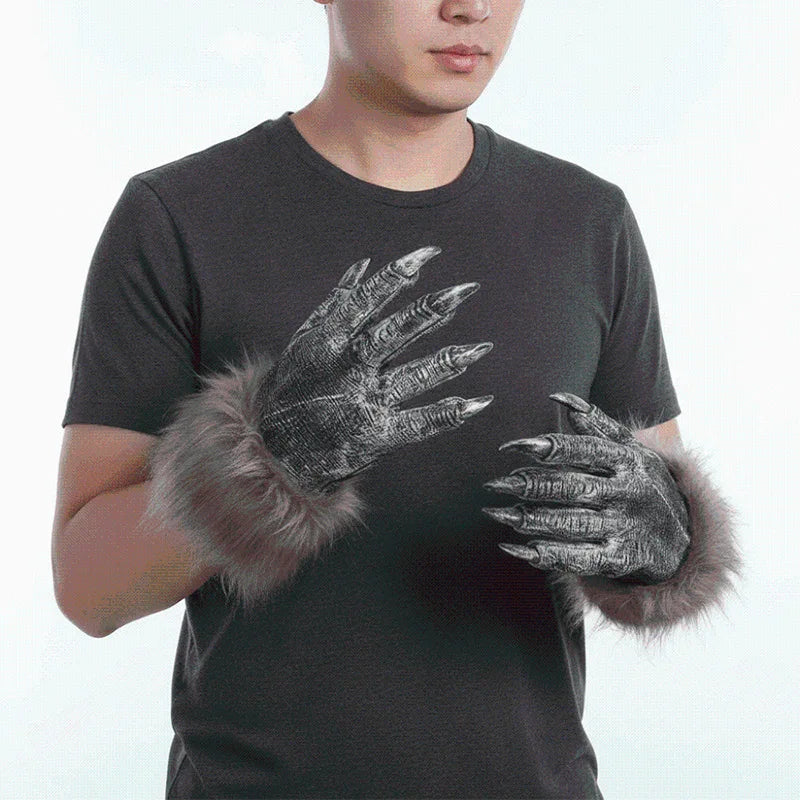 A person wearing a black t-shirt with a detailed silver werewolf hand print on the chest.