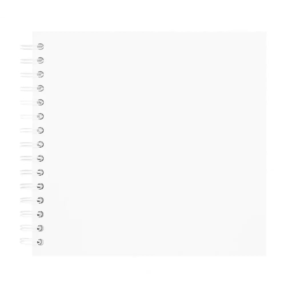 A blank spiral-bound notebook or scrapbook album page.