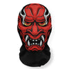 A close-up of a red and black Halloween skeleton face mask with fierce eyes and sharp teeth.