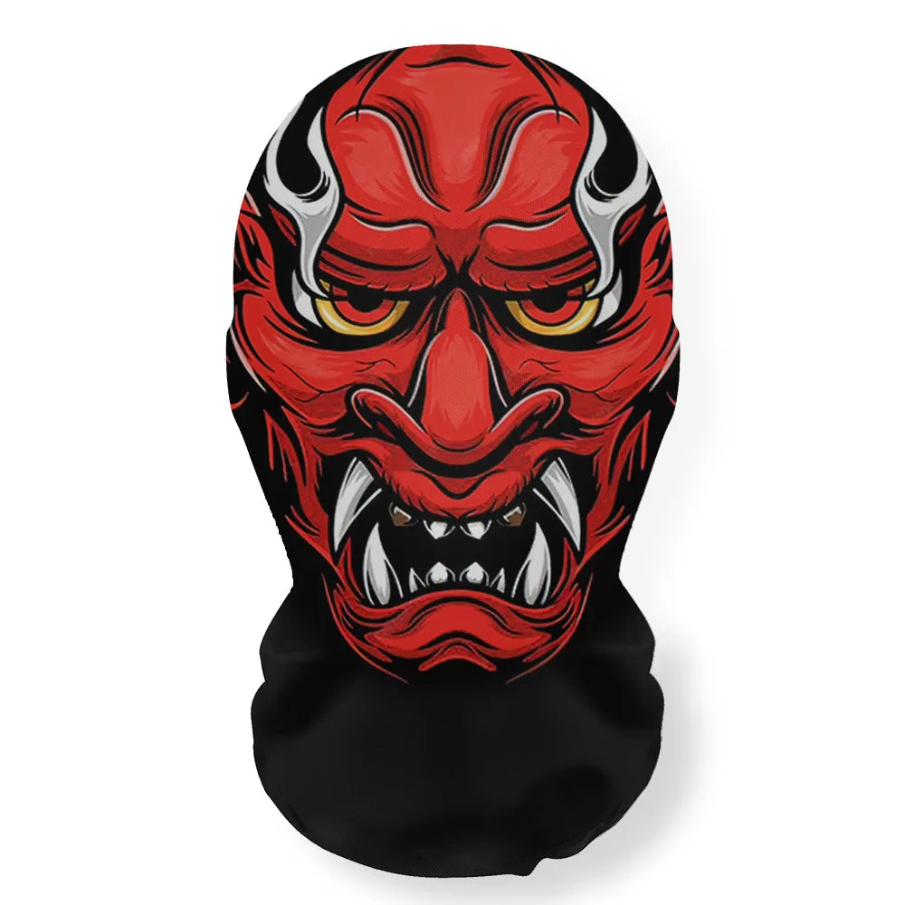 A close-up of a red and black Halloween skeleton face mask with fierce eyes and sharp teeth.