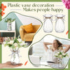 Clear plastic vase decoration with a natural twine bow used for table decor.