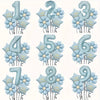 A set of light blue foil balloons shaped like numbers 1 through 9, featuring floral accents.