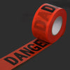 Roll of red caution tape with the word DAD visible on the label and a long strip of tape labeled DANGE