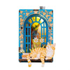 A wooden layered puzzle magnet featuring a bright blue arched frame with floral accents and an orange tabby cat silhouette.