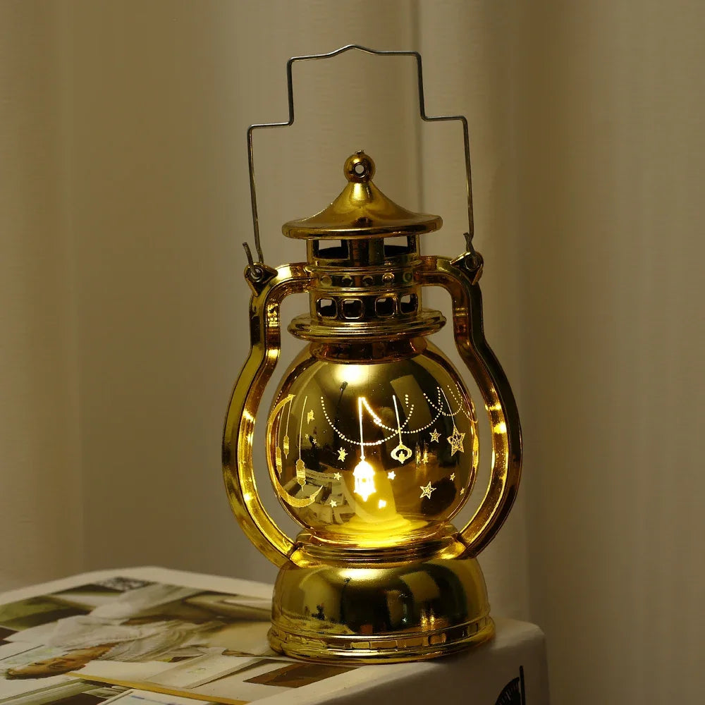 A golden LED lantern night light with a decorative lid and intricate star patterns, displayed on a surface.