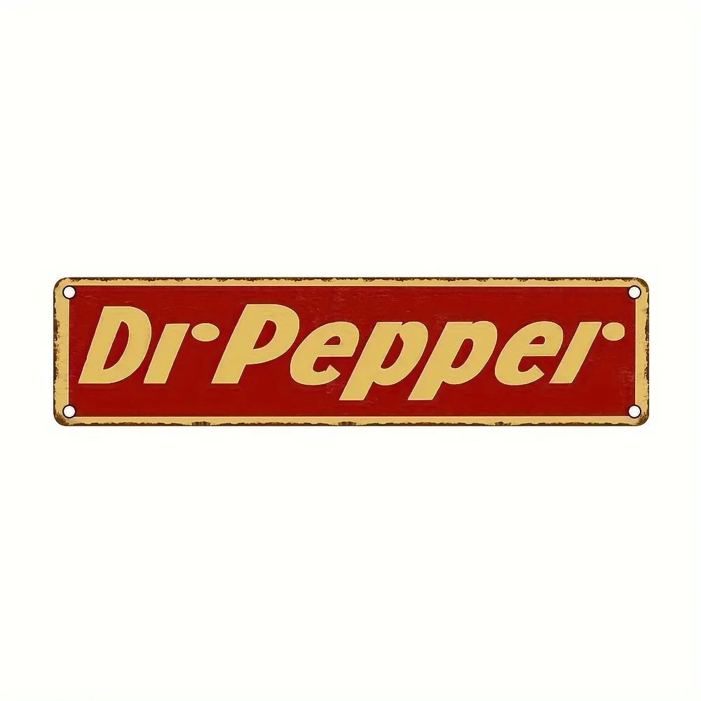 Vintage tiki bar metal sign with the text Dr Pepper in gold lettering on a red background